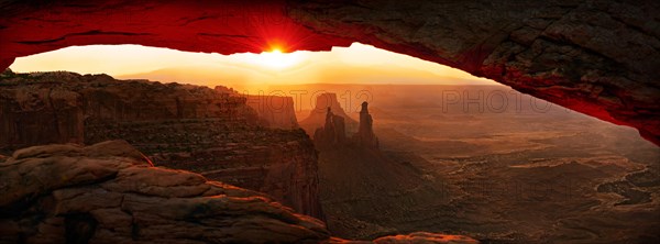 Sunrise at Mesa Arch stone arch