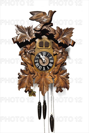 Classic wood-carved Black Forest cuckoo clock