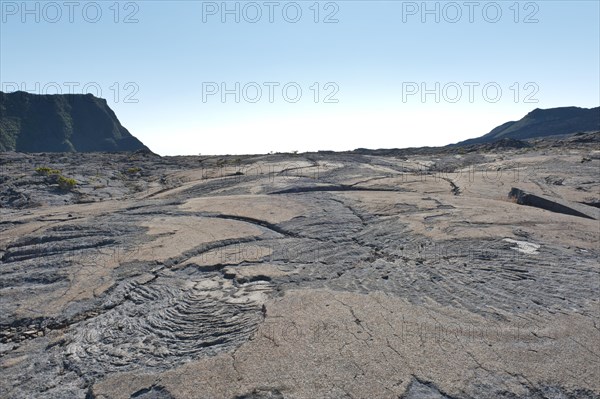 Cooled lava flow at the foot of the Piton de la Fournaise volcano