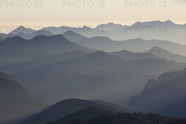 Backlit mountain ridges seen from Hochiss Mountain in Rofan