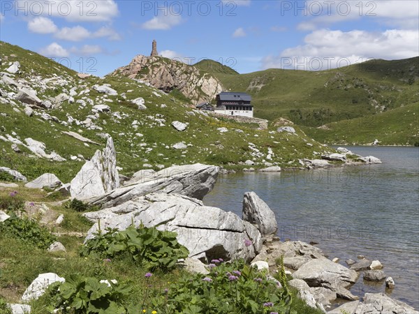 Wolayer Lake or Wolayersee with the Wolayersee hut and war memorial