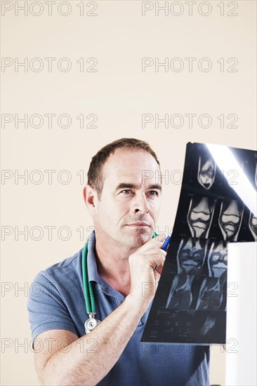 Doctor looking at an X-ray