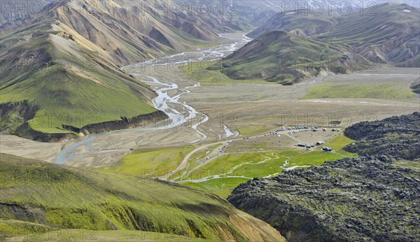 View from Suournamur Mountain over the Laugahraun lava field with cabins and a camping site