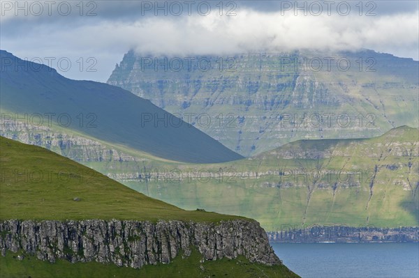 Clouds over the islands of Kalsoy and Kunoy