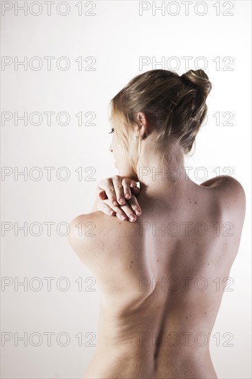 Bare back of a young woman