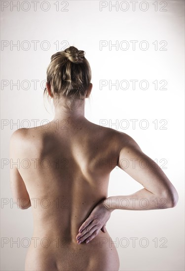 Bare back of a young woman