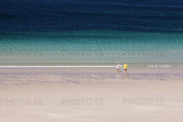 Tourist taking pictures at White Sands Beach