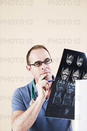 Doctor looking at an X-ray