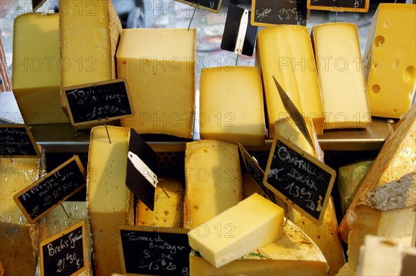 Cheese on a cheese stall at a market