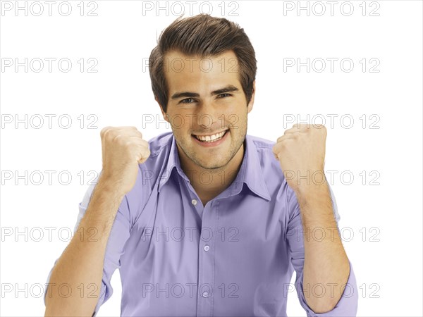 Businessman clenching fists