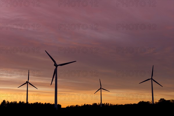 Wind turbines at sunset