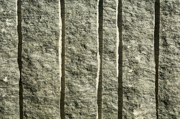 Drill hole traces in a block of Verde Bitterfontein granite or Charnockite granite