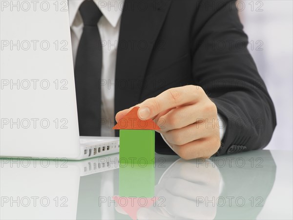 Businessman in an office with a laptop