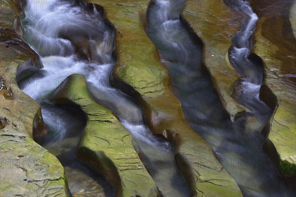 Rock gullies formed by water in the riverbed