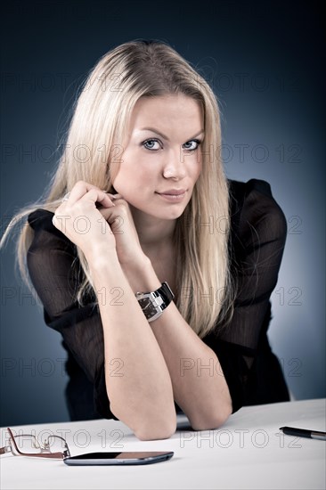 Young woman sitting at a desk