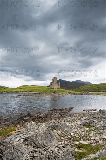 Ruins of Ardvreck Castle on a peninsula in the lake of Loch Assynt