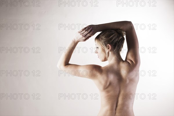 Bare back of a young woman