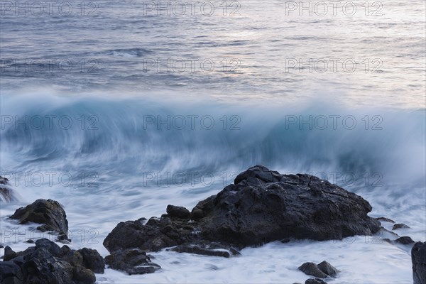 Surf on a rocky coast