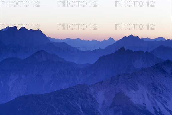 Mountain ridges at sunset from Mount Hochiss in the Rofan massif