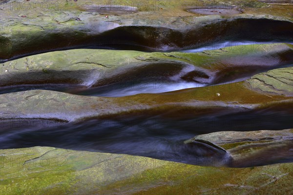 Rock gullies formed by water in the riverbed