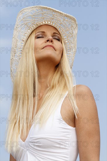 Women with a summer hat