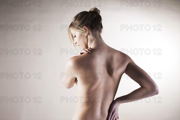 Bare back of a young woman