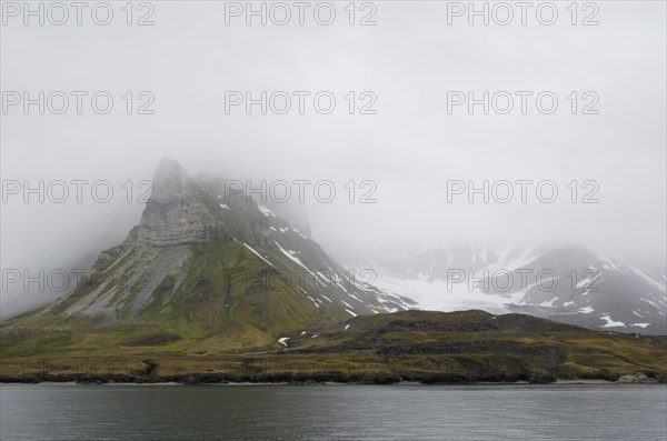 Mist veiling Alkhornet mountain