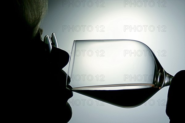 Woman drinking red wine