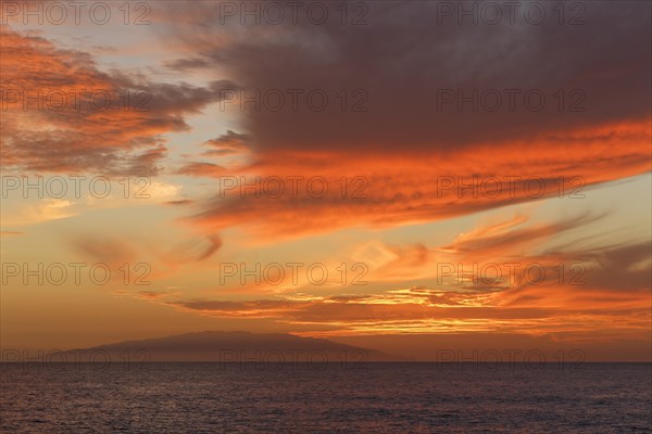 Evening sky with clouds and El Hierro island