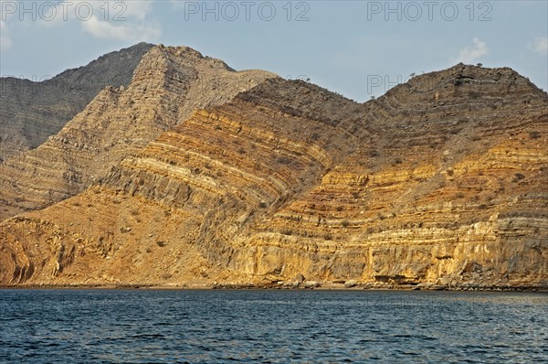 Folded rocks as a result of geological processes