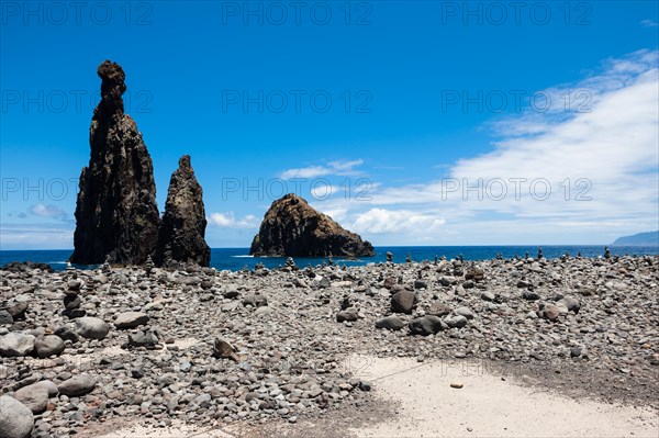 Cairns built as good luck charms at the Ilheus da Rib rock formation