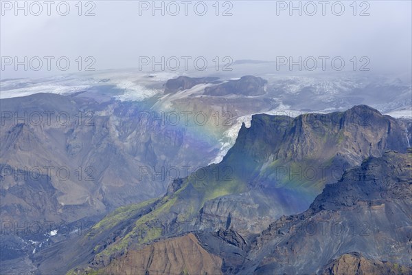 Gorges of Thorsmork below the Myrdalsjokull glacier with a rainbow