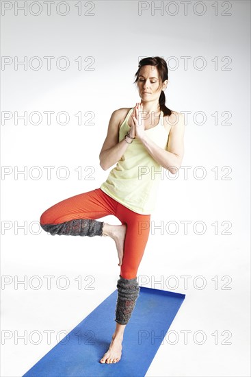 Woman doing yoga exercises