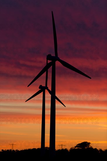 Wind turbines at sunset