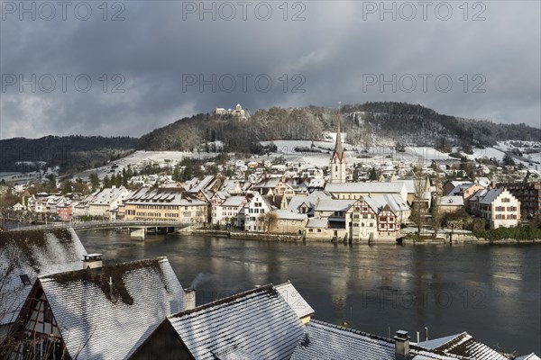 View over the Rhine River towards the historic town centre of Stein am Rhein with Burg Hohenklingen Castle
