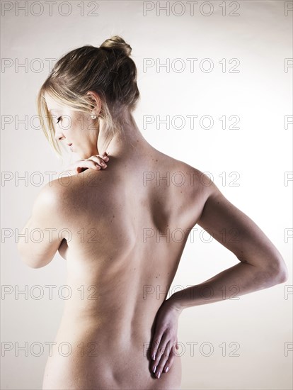 Bare back of a young woman