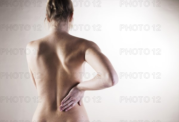 Bare back of a young woman