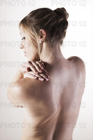 Bare back of a young woman