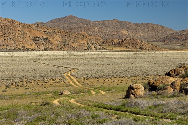 Trail for off-road vehicles through a steppe landscape