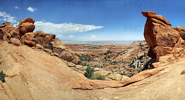 Red sandstone formations formed by erosion at Devil's Garden