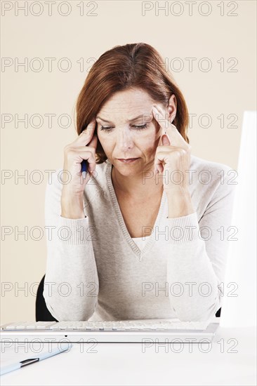 Woman sitting at her computer