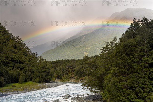 Makarora River with a rainbow