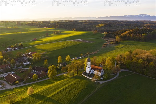 Holzhausen with St. Johann Baptist church in the morning light