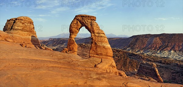 Delicate Arch natural stone arch in front of the La Sal Mountains