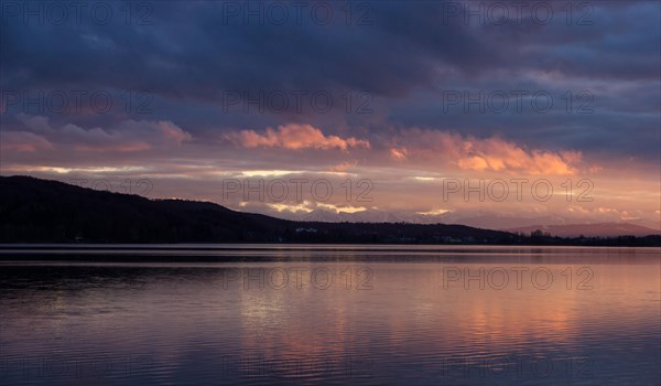 Evening at the lake with mountains