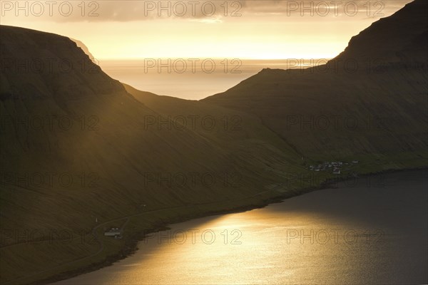 Dramatic mood lighting over the island of Kalsoy