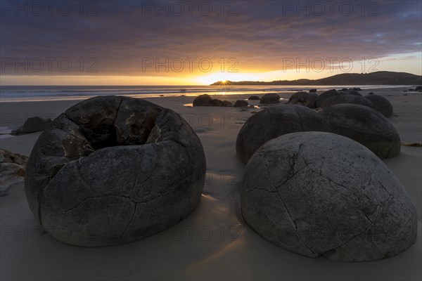 Moeraki Boulders on the beach at sunrise