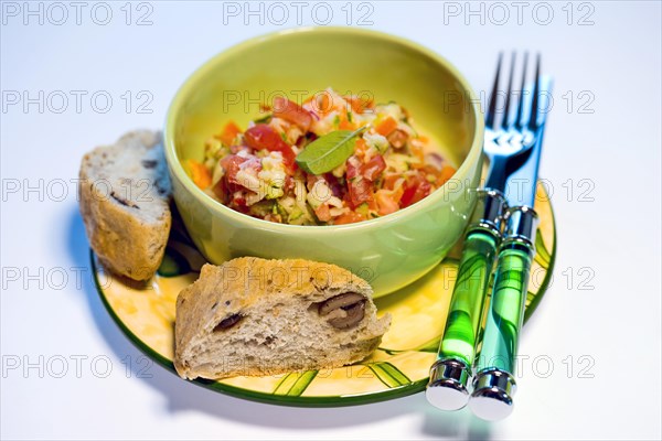 Organic vegetable salad with organic wholemeal and olive baguette