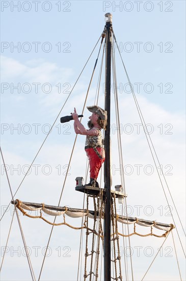 Pirate looking through telescope