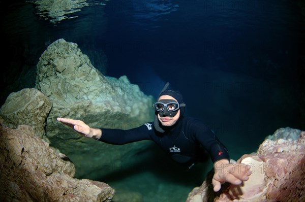 Freediver in a cave